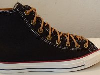 Black and Biscuit High Top Chucks  Right outside view of black and biscuit high top chucks.